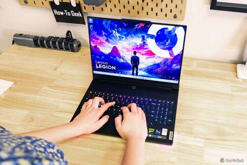 Person using the Lenovo Legion 9i