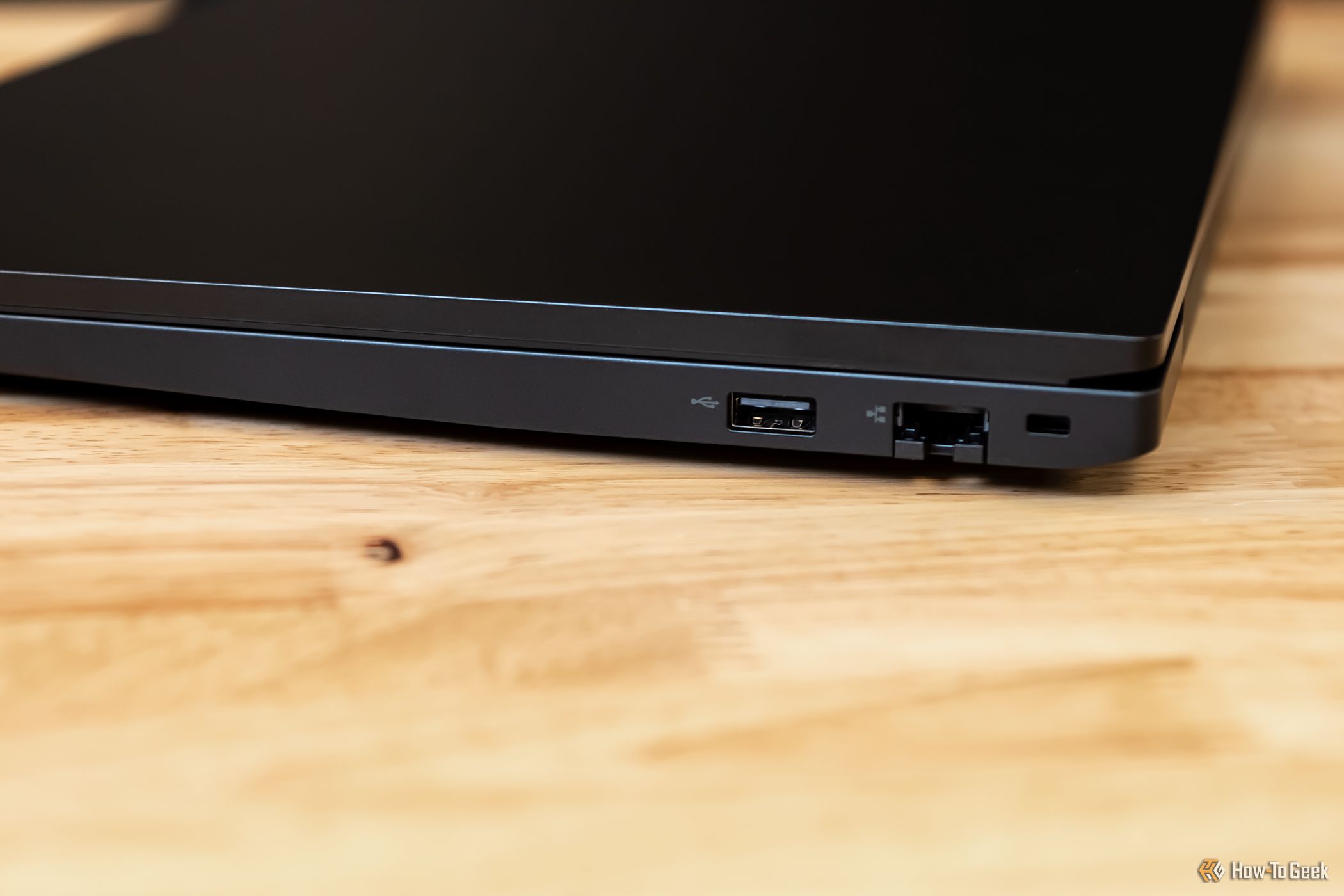 Lenovo ThinkPad E16 Gen 1 closed showing its right side on a desktop