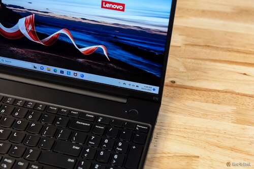 Lenovo ThinkPad E16 Gen 1 open on a desktop showing a close-up of its upper right side