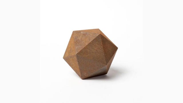 A rusted iron docahedron