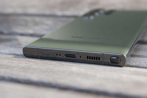 The bottom frame of the Samsung Galaxy S23 Ultra, showing the USB-C port, speaker grille, and S Pen slot.