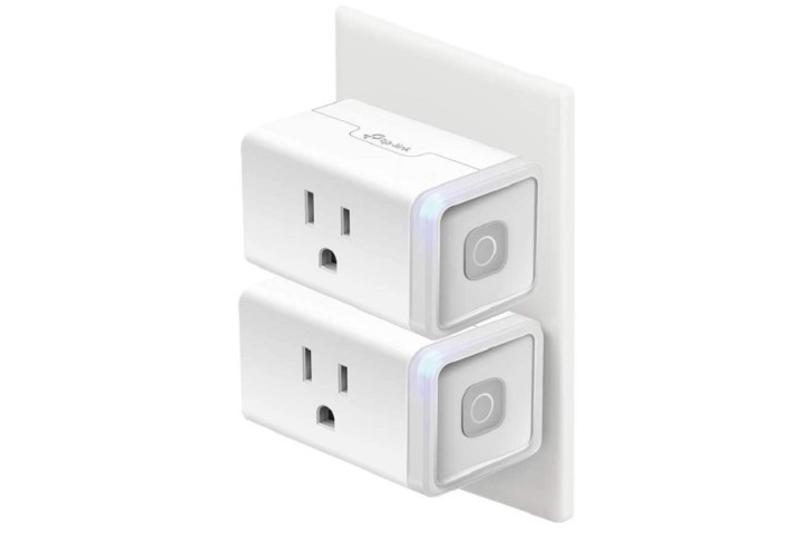 The TP-Link Kasa Smart Plug with a power cable attached.