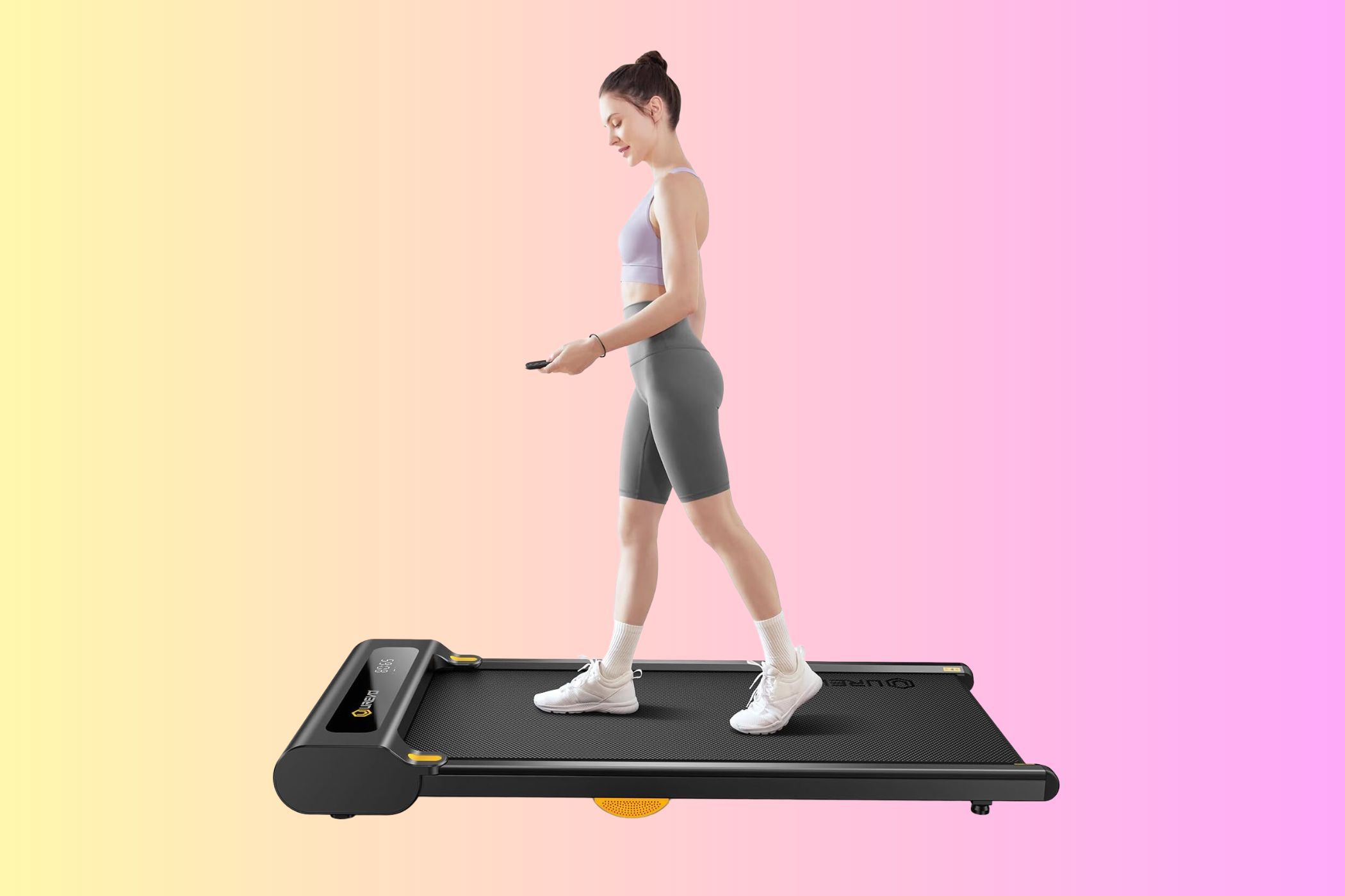 Woman walking on Elseluck Under-Desk Treadmill