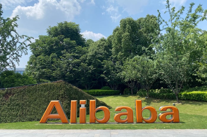 Alibaba letters standing in a field.