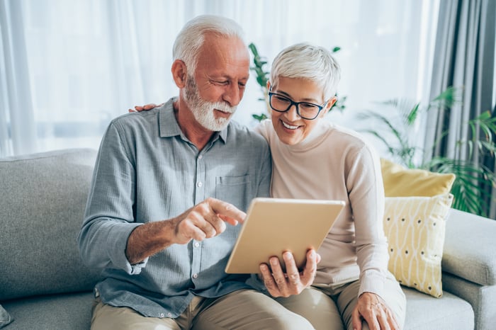 Older couple looking at information.