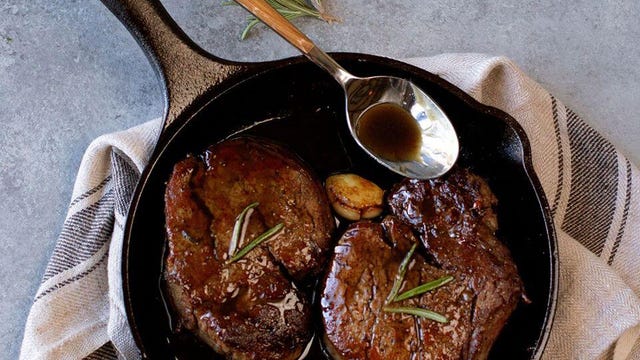 A cast-iron pan with food in it