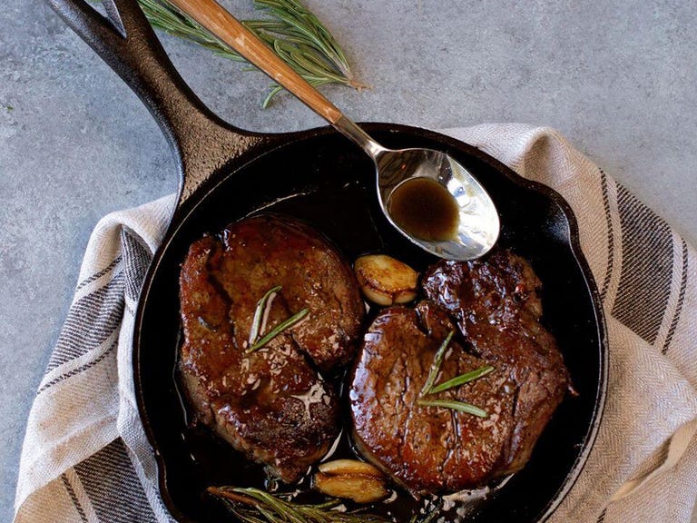 A cast-iron pan with food in it