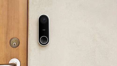 Nest Video Doorbell on a stucco wall.