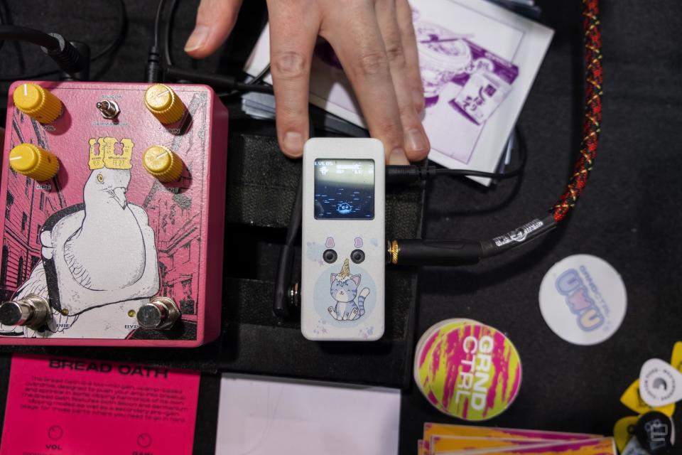 The Ground Control Audio UwU virtual pet buffer pedal on a pedalboard next to the Ground Control Audio Bread Oath Overdrive.