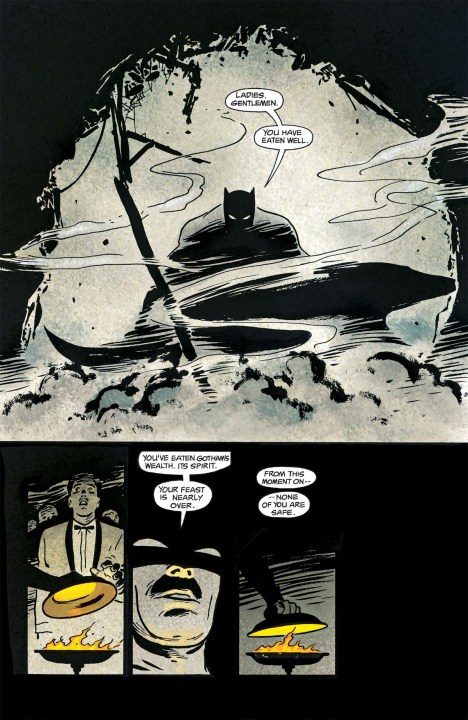 Batman issues a warning to the mob in Batman: Year One.