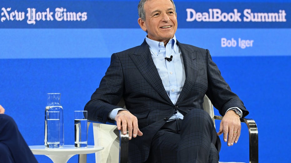 Bob Iger speaks on stage