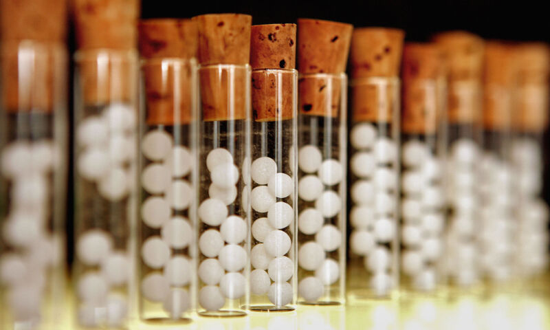 Extreme close-up photograph of a row of vials.