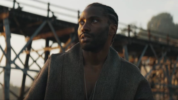 John David Washington stares in the distance in The Creator.