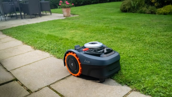 The Segway Navimow i108 mowing a lawn.