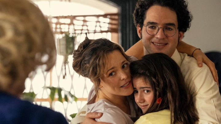 Barbara, Margaret, and Herb Simon embracing and looking at someone with their back to the camera in Are You There God? It's Me, Margaret.