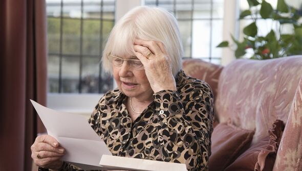 A woman checks her bills