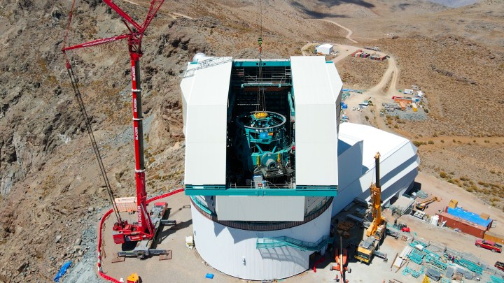 Cranes lift the Top-End Assembly (TEA) into Vera C. Rubin Observatory.