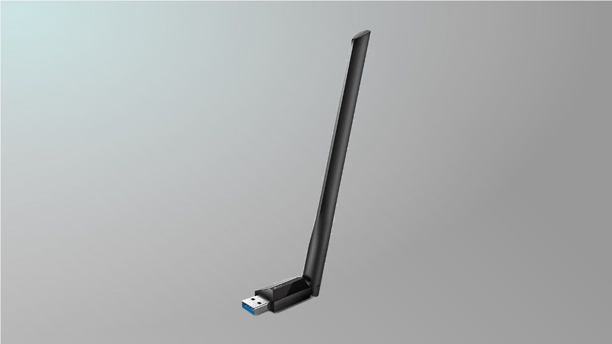 TP-Link Archer T3U Plus on grey background