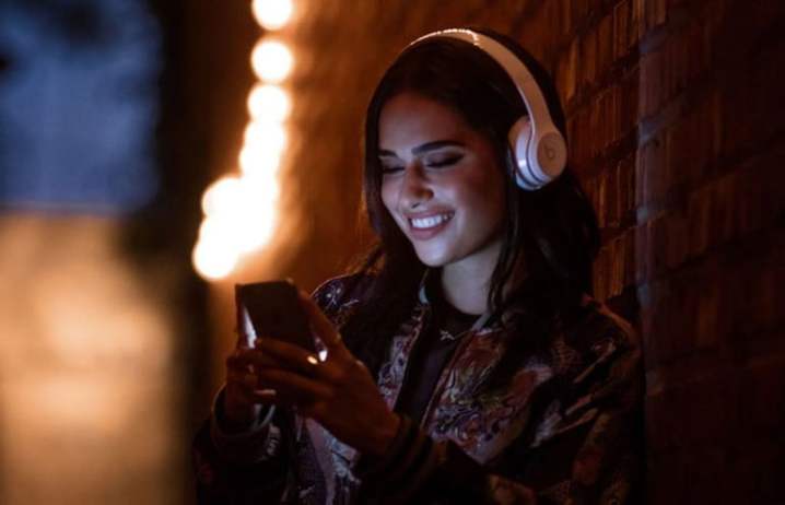 A woman listening to her Beats Solo3.