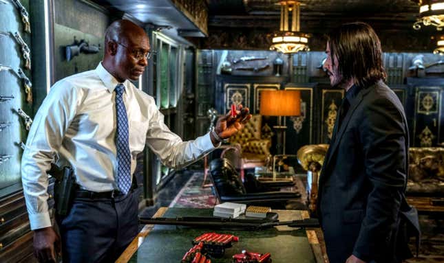 Charon (Lance Reddick) and John Wick (Keanu Reeves) in John Wick: Chapter 3.