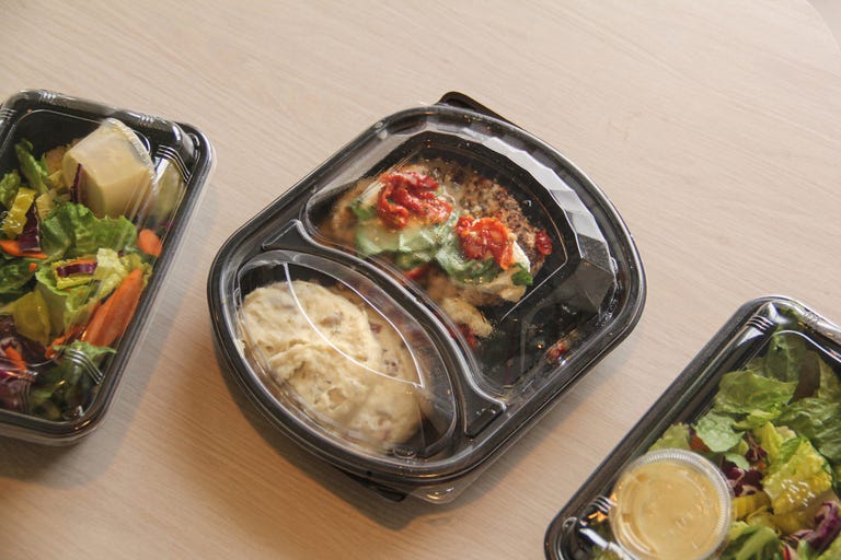 black plastic takeout containers