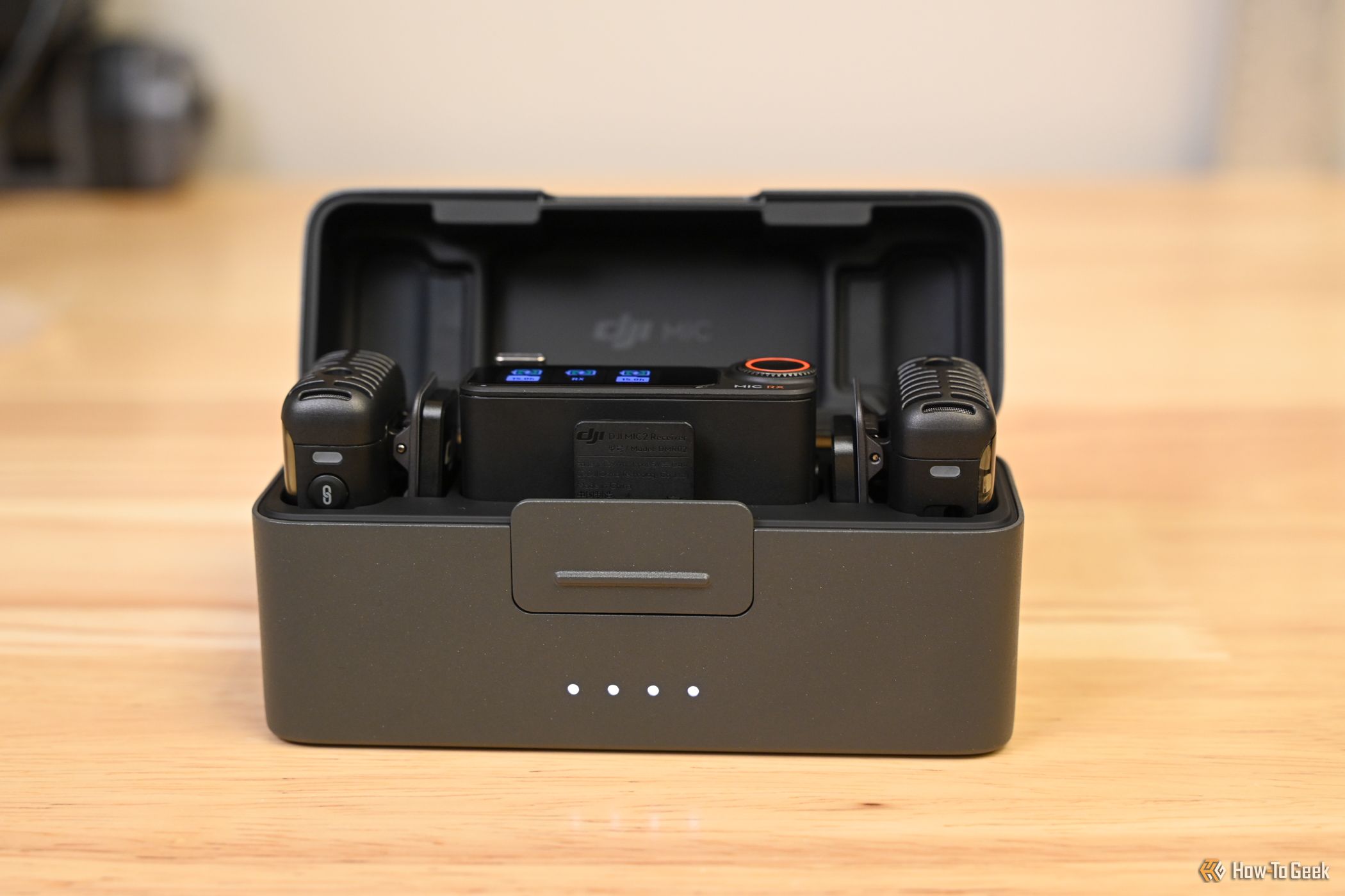 Components of the DJI Mic 2 in the charging case