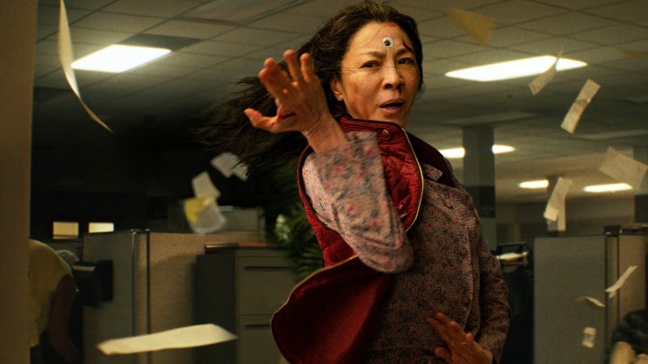 Michelle Yeoh performs kung fu in a scene from Everything Everywhere All At Once.