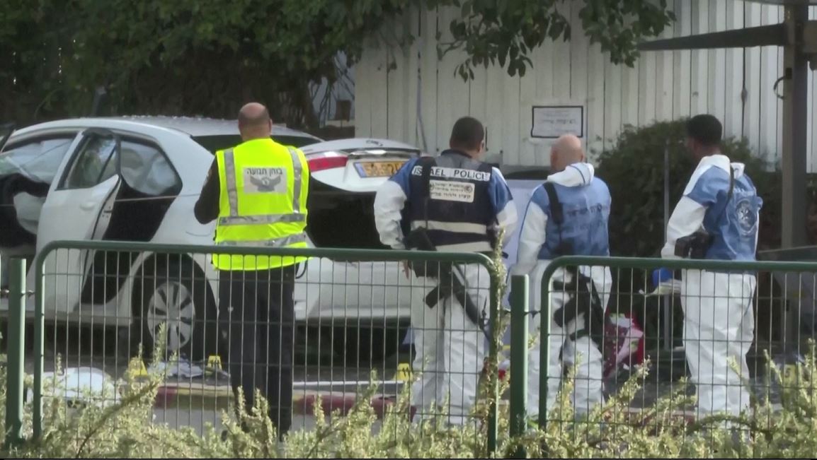 Israel's police spokesperson Master Sergeant Dean Elsdunne at the scene of the car-ramming attacks in Ra’anana