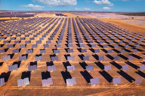 Solar panels that track the sun in a large solar farm.