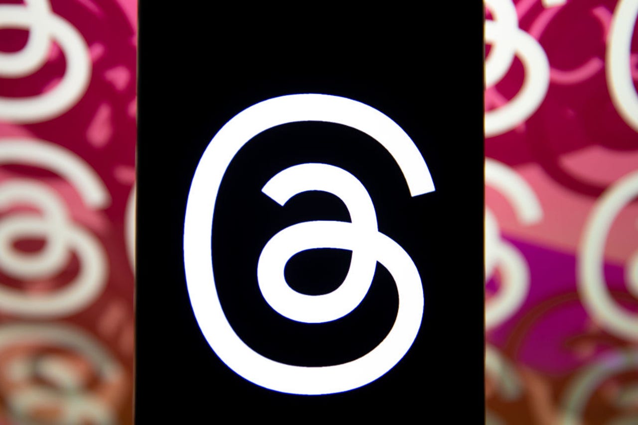 Threads logo on phone