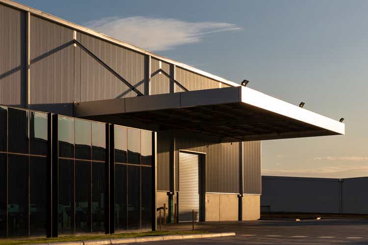 Industrial Office & Warehouse Architecture Bathed In Afternoon Light