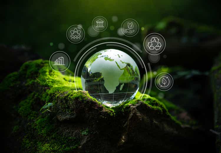 Crystal globe putting on moss, ESG icon for Environment Social and Governance,