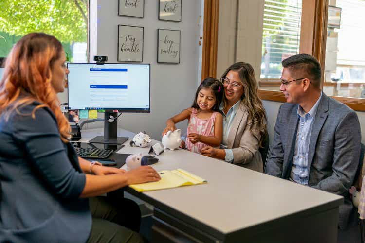 Couple opening bank account for their daughter