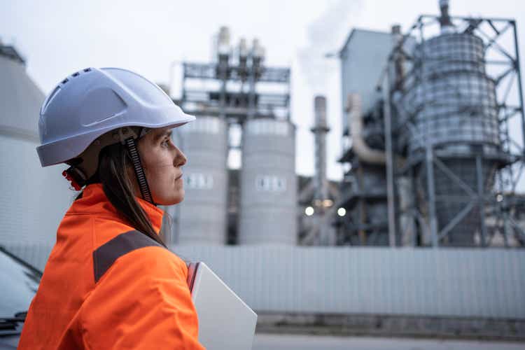 Woman engineer working in power plant.