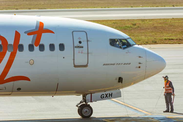 Congonhas airport, São Paulo, Brazil. Gol Airlines. Boeing 737-800 plane stopped on the runway. Communication with the ground crew operator.