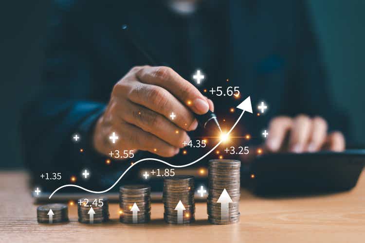 Bank interest rate, finance dividend concept. Businessman calculating saving trade, yield return on money investment, data stock, tax graph return, retirement compensation fund, business market