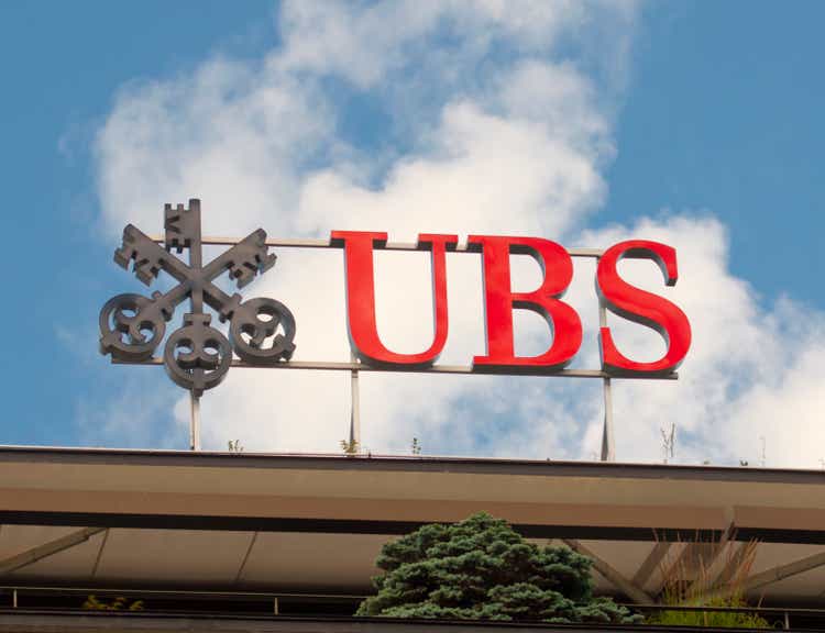 Swiss bank UBS logo on Zurich headquarters building rooftop