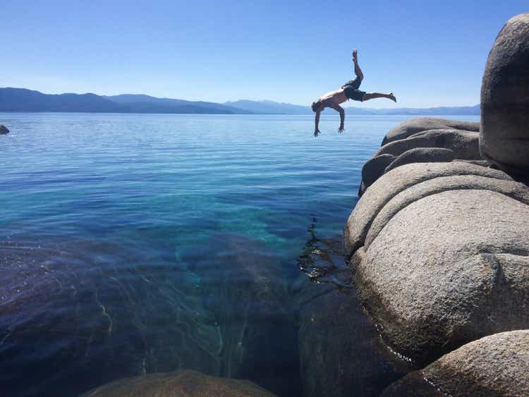 Man jumping wildly into Lake Tahoe