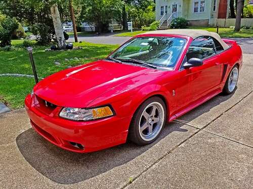 1999 Ford Mustang Cobra SN95 parked driveway