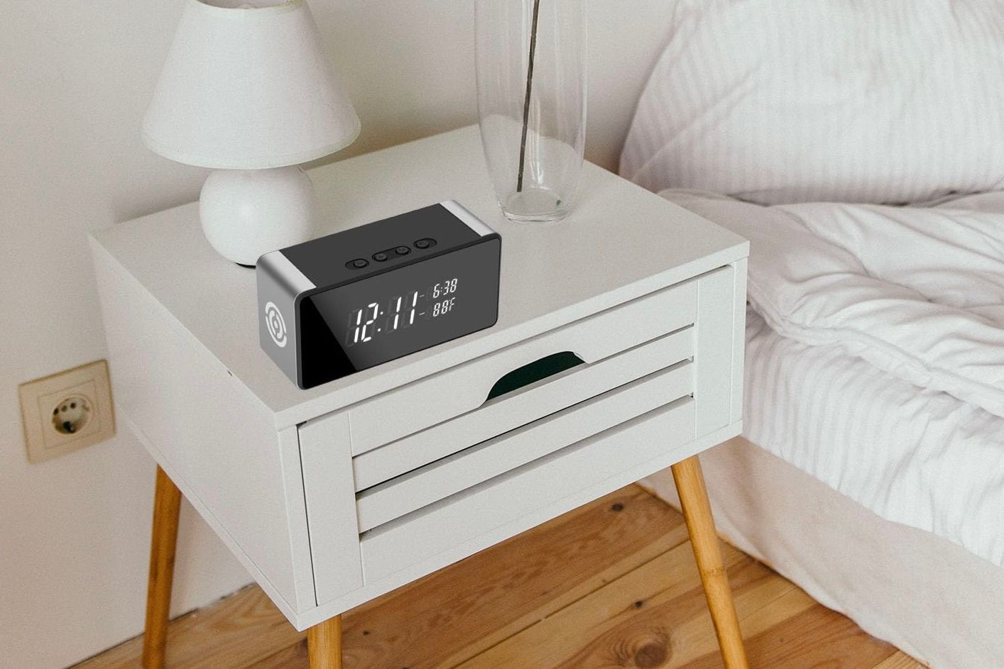 The Librefly Hidden Cam Alarm Clock set up on a bedside table.