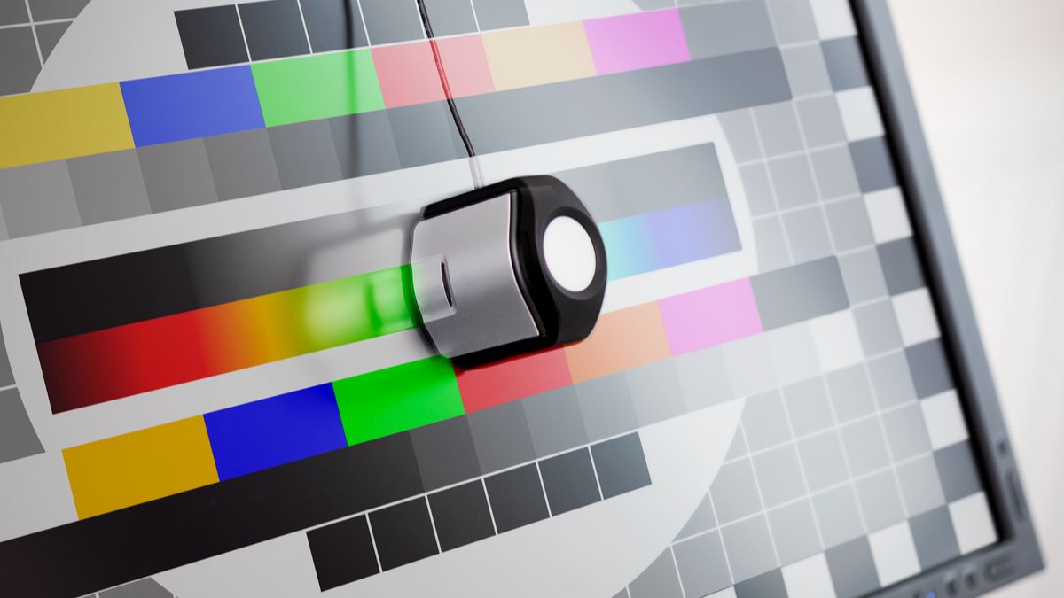 Closeup of a monitor being color-calibrated.