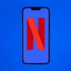 Netflix logo on an iPhone with blue background