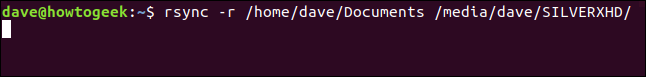 rsync -r /home/dave/Documents /media/dave/SILVERXHD/ in a terminal window