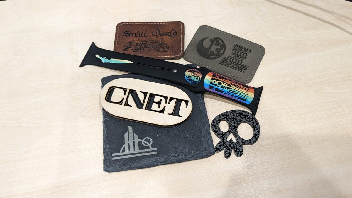 Multiple laser cuts using leather, acrylic, and slate