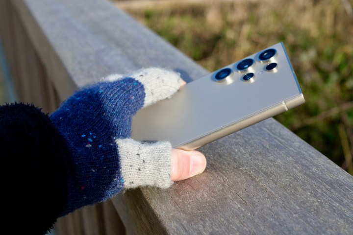 A person holding the Galaxy S24 Ultra.