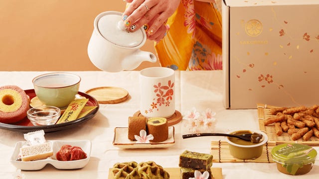 japanese sweet snacks and tea arranged on table