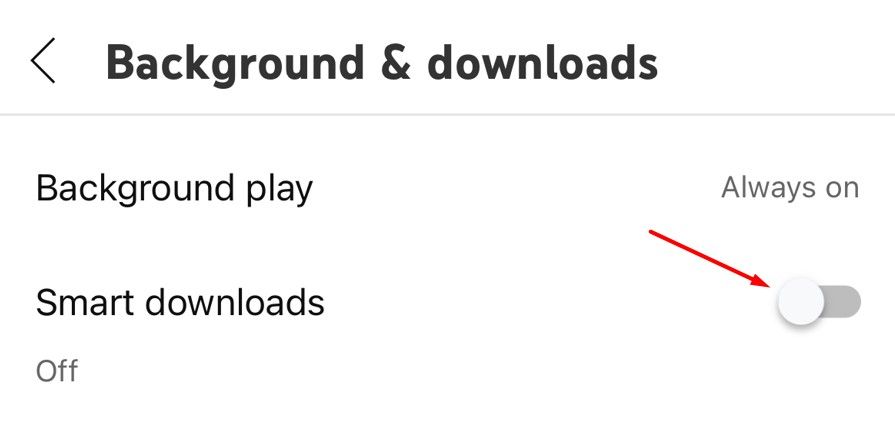 Smart Downloads toggle on YouTube iPhone app.