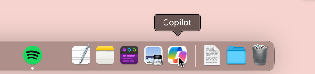 The Copilot web app appears in the Dock on a Mac.