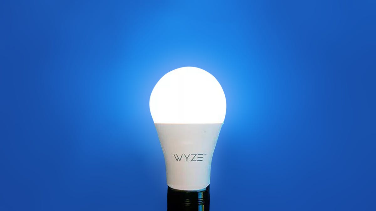 A lit Wyze lightbulb