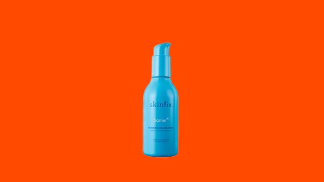 Skinfix barrier oil cleanser on an orange background